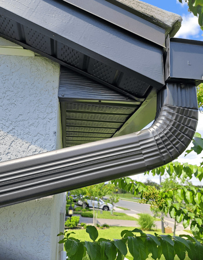 Close up photo of a reainage system on a house